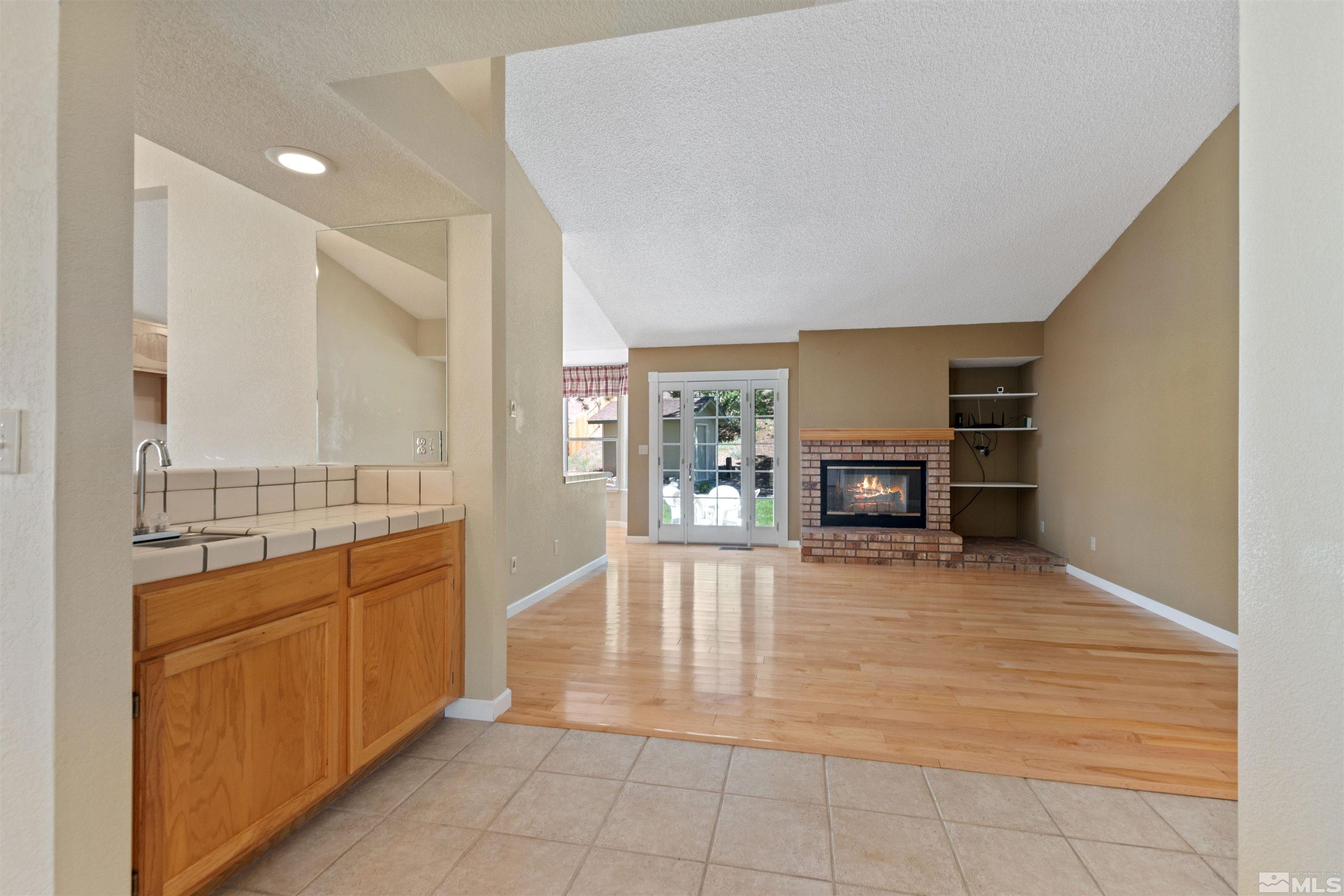 575 Cliff View Drive Reno, NV 89523 - Photo 15 of 33 a view of an empty room with a kitchen