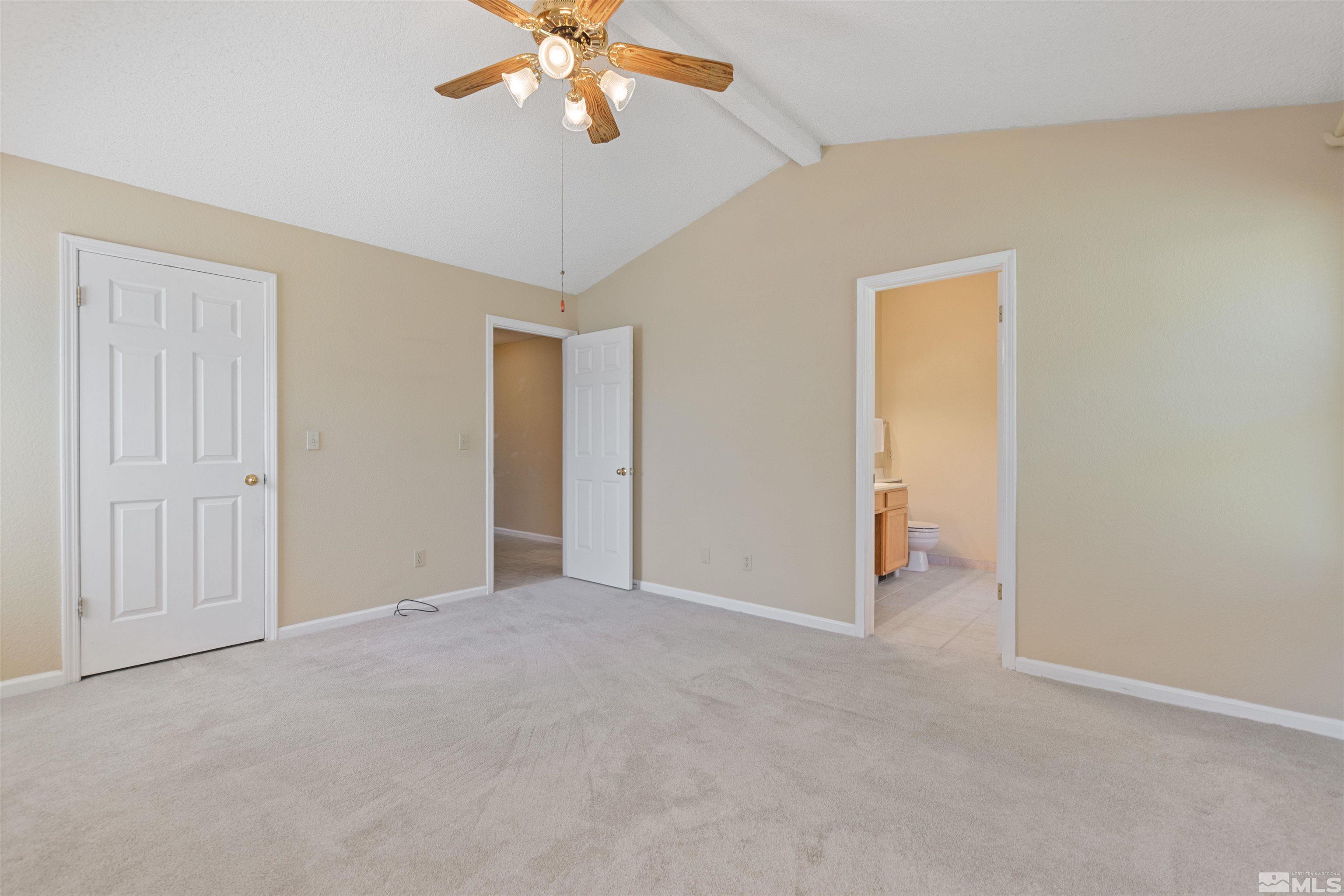 575 Cliff View Drive Reno, NV 89523 - Photo 25 of 33 a view of an empty room and chandelier fan