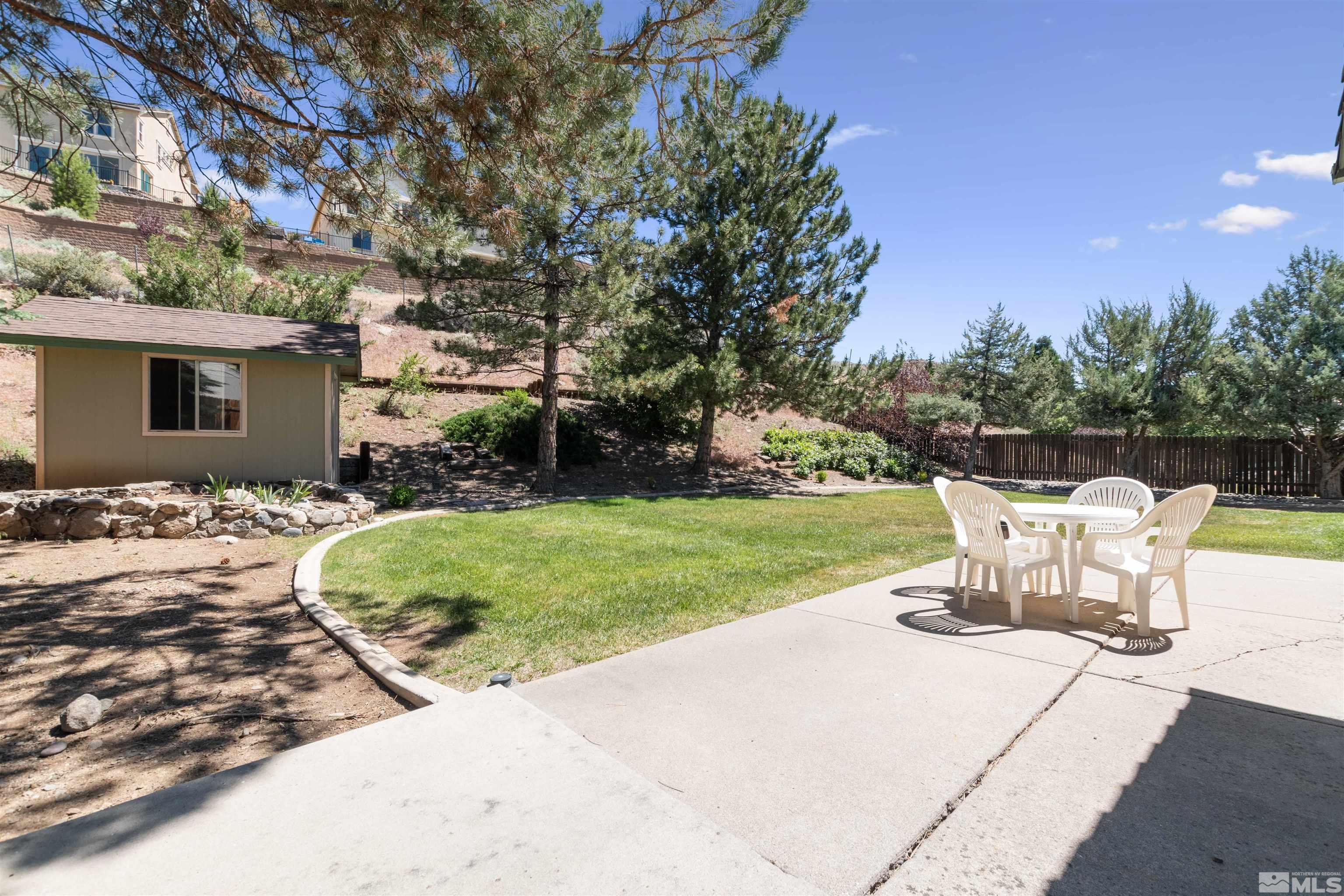 575 Cliff View Drive Reno, NV 89523 - Photo 31 of 33 a view of a backyard with sitting area