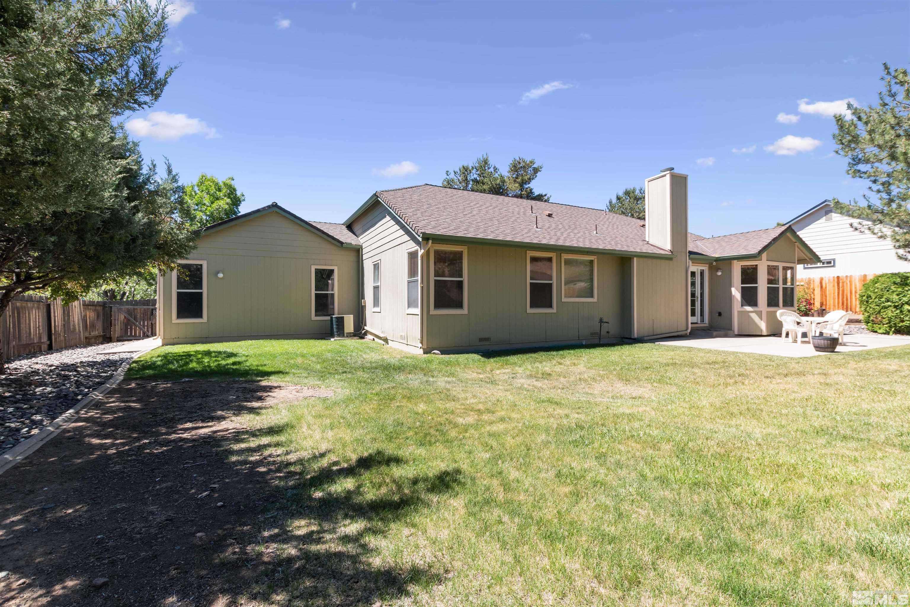 575 Cliff View Drive Reno, NV 89523 - Photo 5 of 33 a view of a house with a backyard