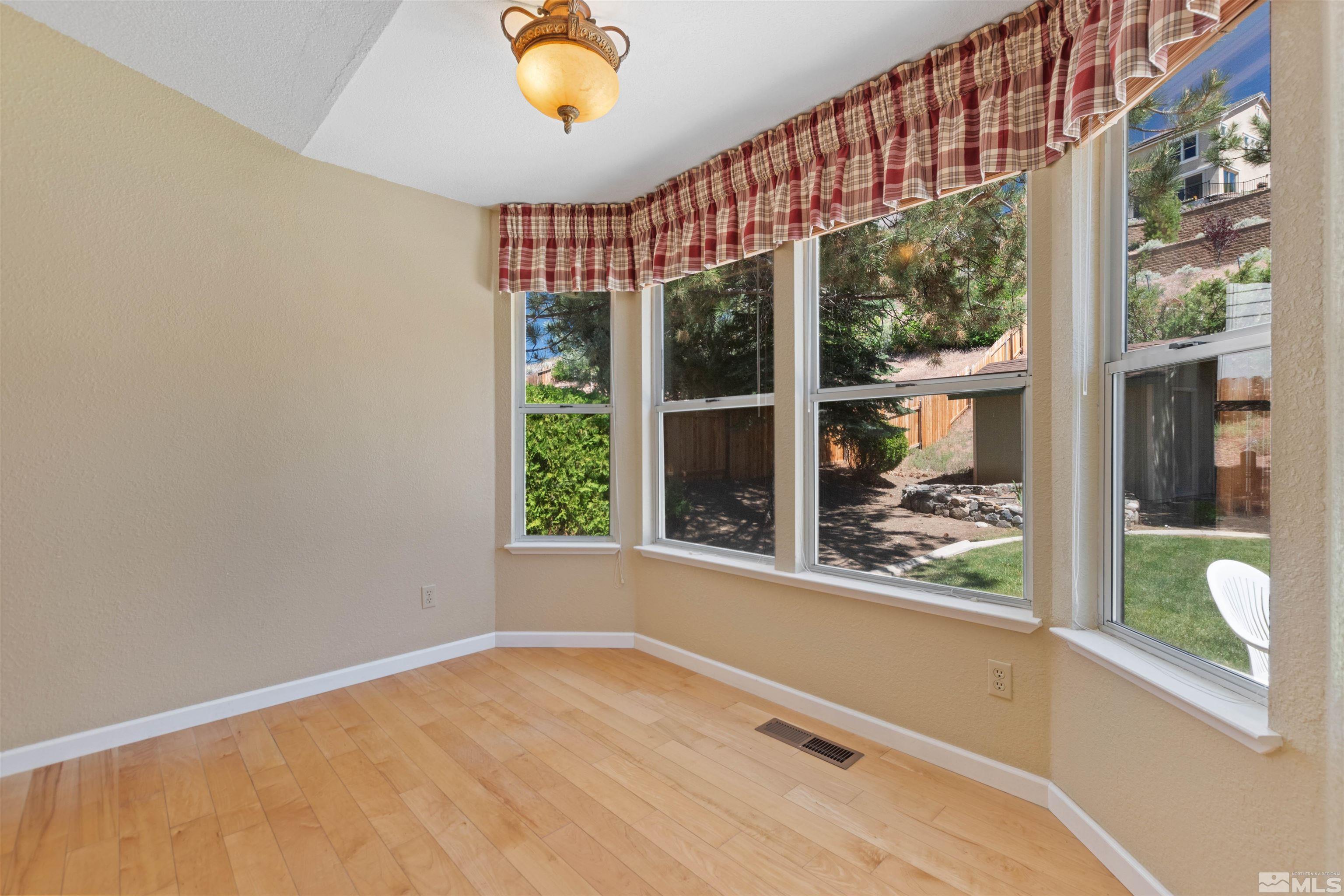 575 Cliff View Drive Reno, NV 89523 - Photo 10 of 33 a view of an empty room with a window