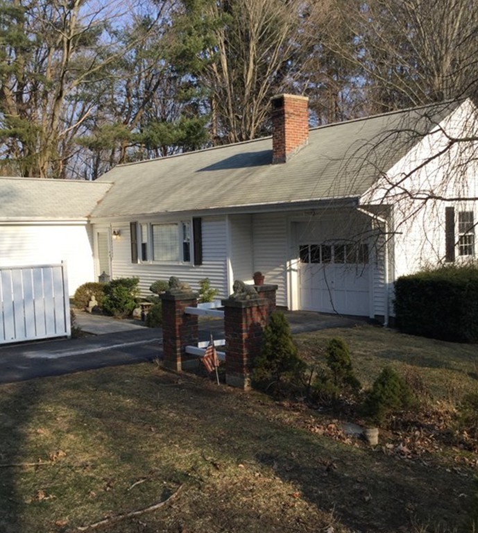 150 Barton Road Wellesley, MA 02481 - Photo 1 of 20 a view of a house with backyard and sitting area