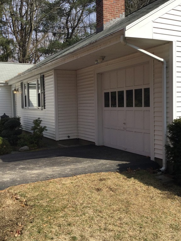 150 Barton Road Wellesley, MA 02481 - Photo 3 of 20 a view of a house with a yard