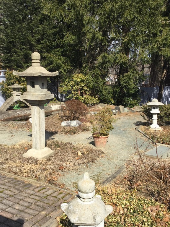 150 Barton Road Wellesley, MA 02481 - Photo 4 of 20 a view of a yard with an outdoor space