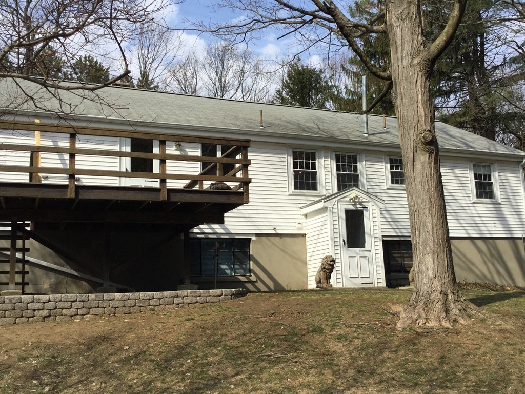 150 Barton Road Wellesley, MA 02481 - Photo 5 of 20 a view of a house with a snow