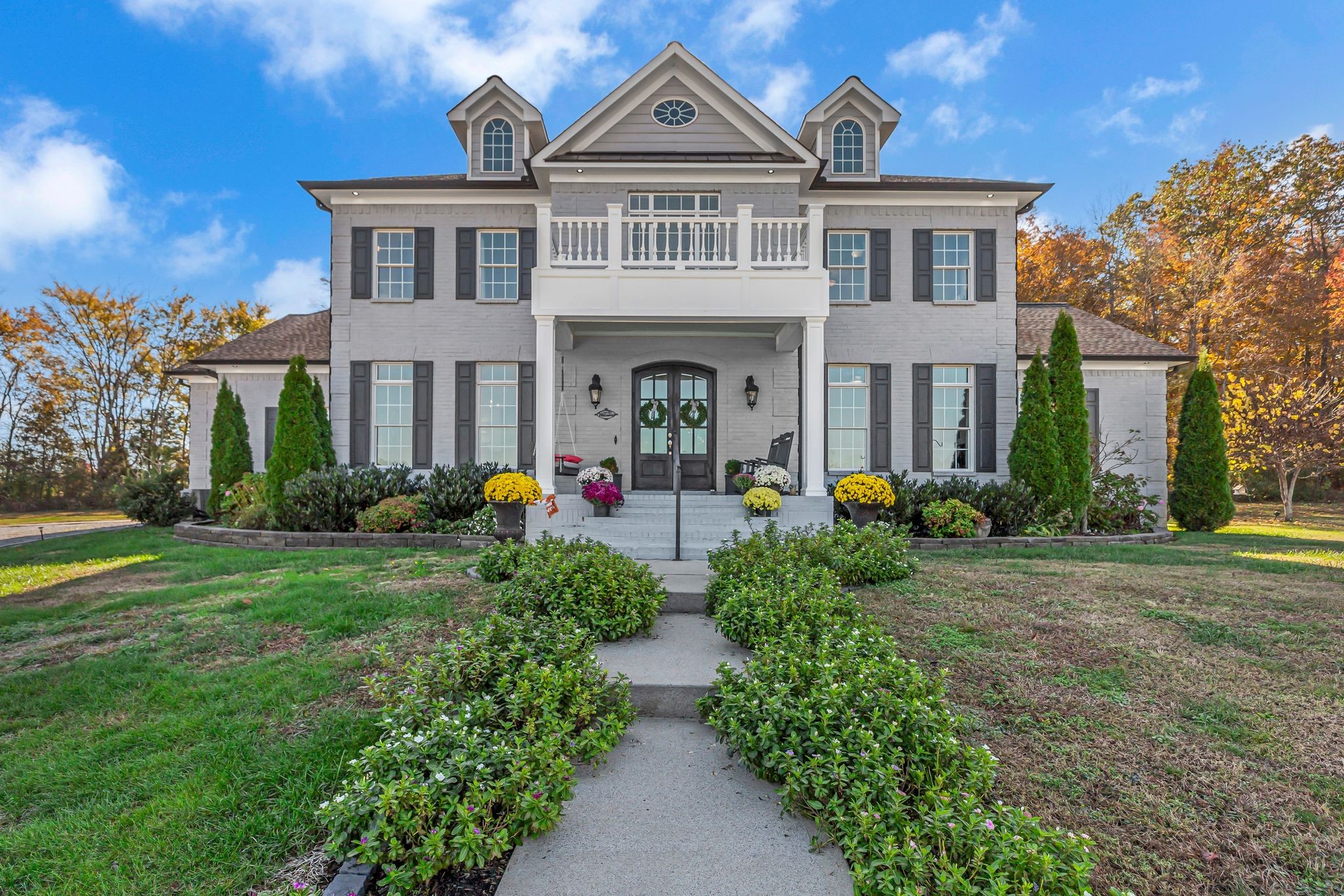 7167 Williams Road Christiana, TN 37037 - Photo 1 of 53 a front view of a house with garden
