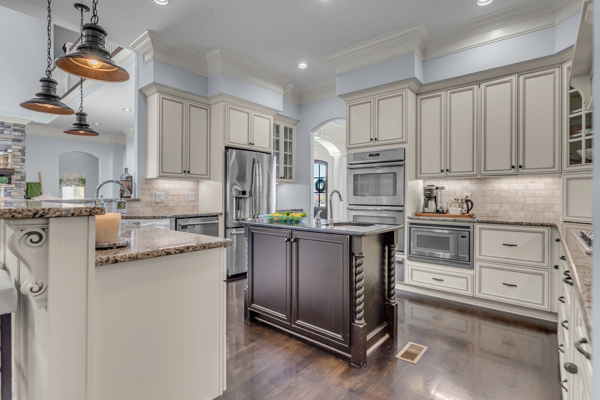 7167 Williams Road Christiana, TN 37037 - Photo 16 of 53 a kitchen with stainless steel appliances granite countertop a refrigerator sink and stove