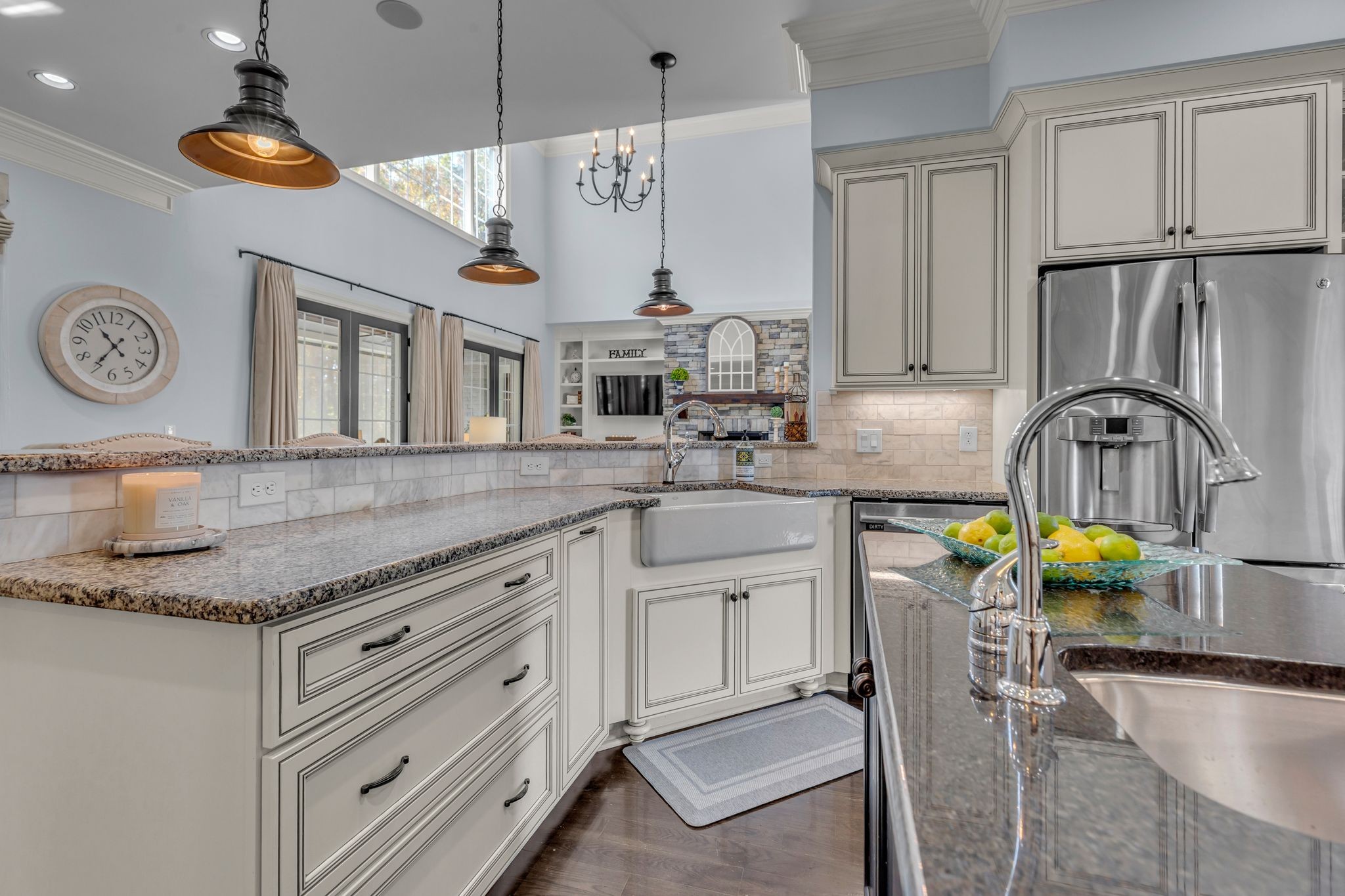 7167 Williams Road Christiana, TN 37037 - Photo 19 of 53 a kitchen with stainless steel appliances granite countertop a sink and a white cabinets