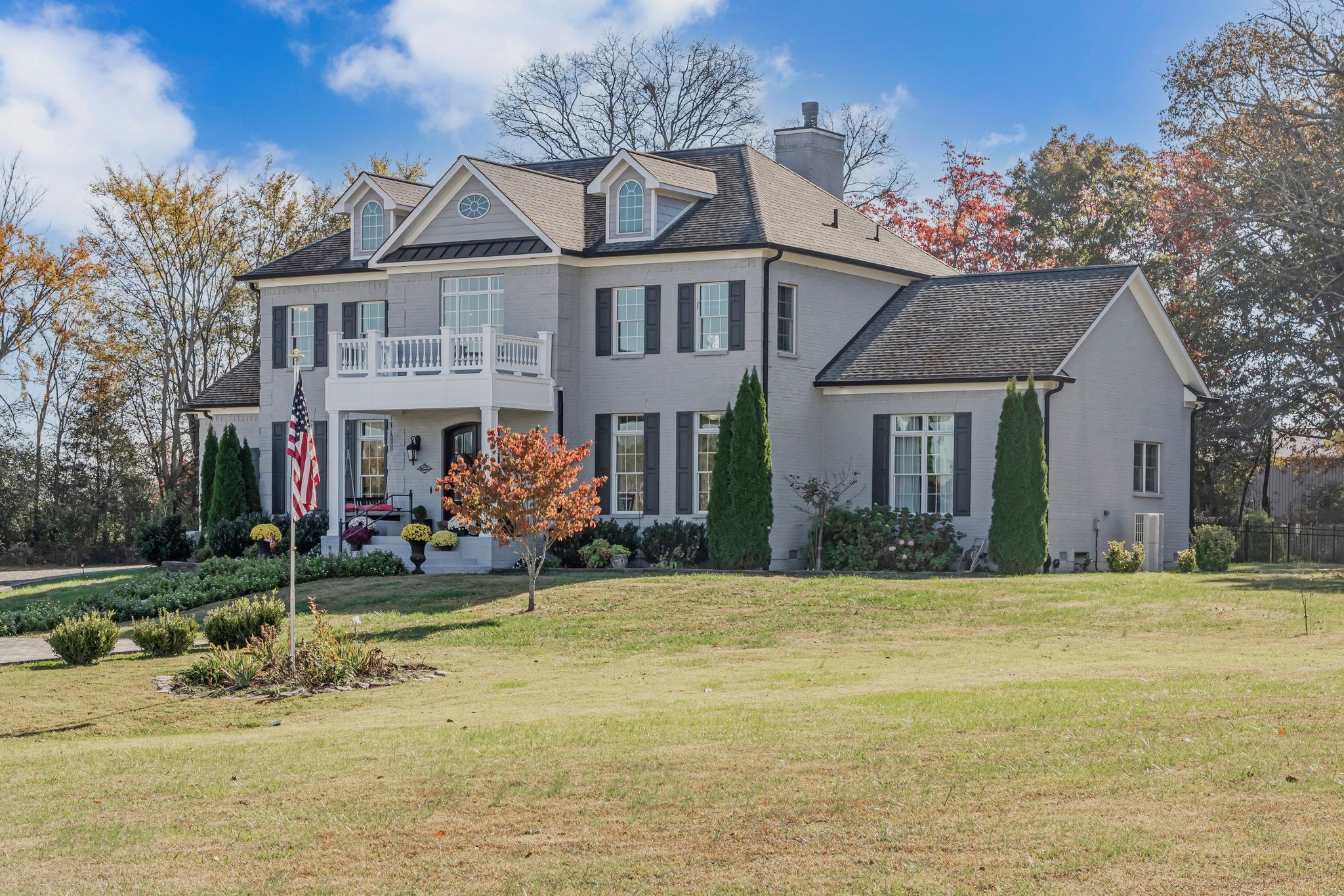 7167 Williams Road Christiana, TN 37037 - Photo 2 of 53 a view of a white house with a large pool and a yard
