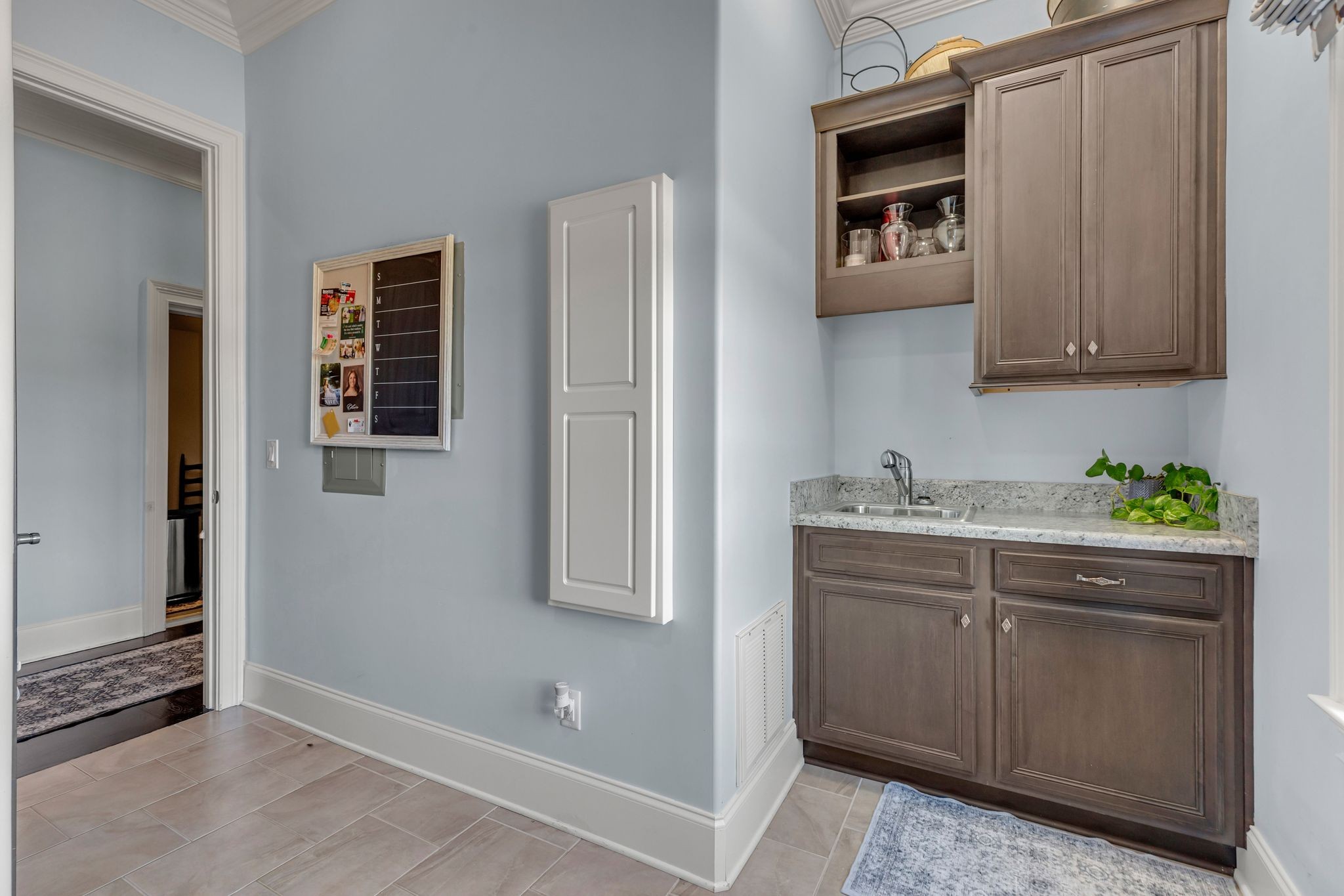 7167 Williams Road Christiana, TN 37037 - Photo 21 of 53 a kitchen with a sink and cabinets