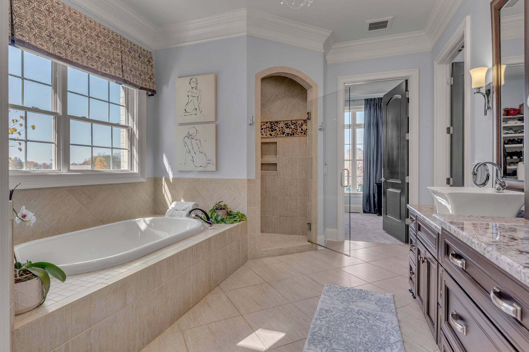 7167 Williams Road Christiana, TN 37037 - Photo 30 of 53 a spacious bathroom with a granite countertop tub sink and mirror