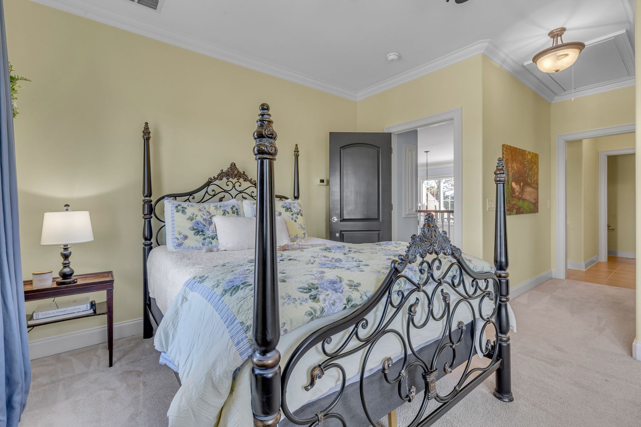 7167 Williams Road Christiana, TN 37037 - Photo 37 of 53 a bedroom with bed and a chandelier