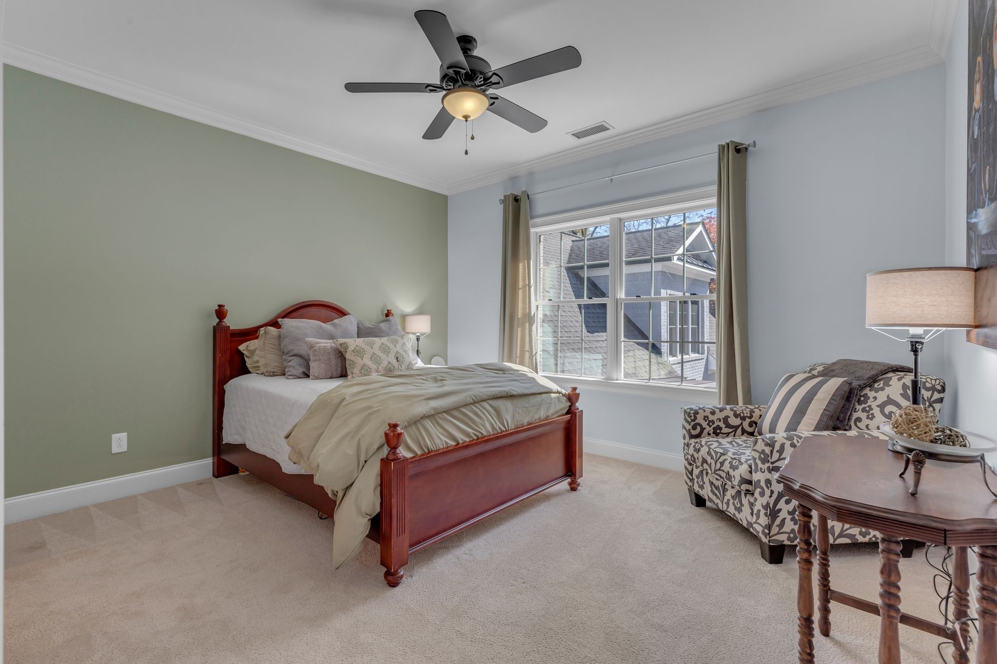 7167 Williams Road Christiana, TN 37037 - Photo 42 of 53 a bedroom with a bed and a chandelier