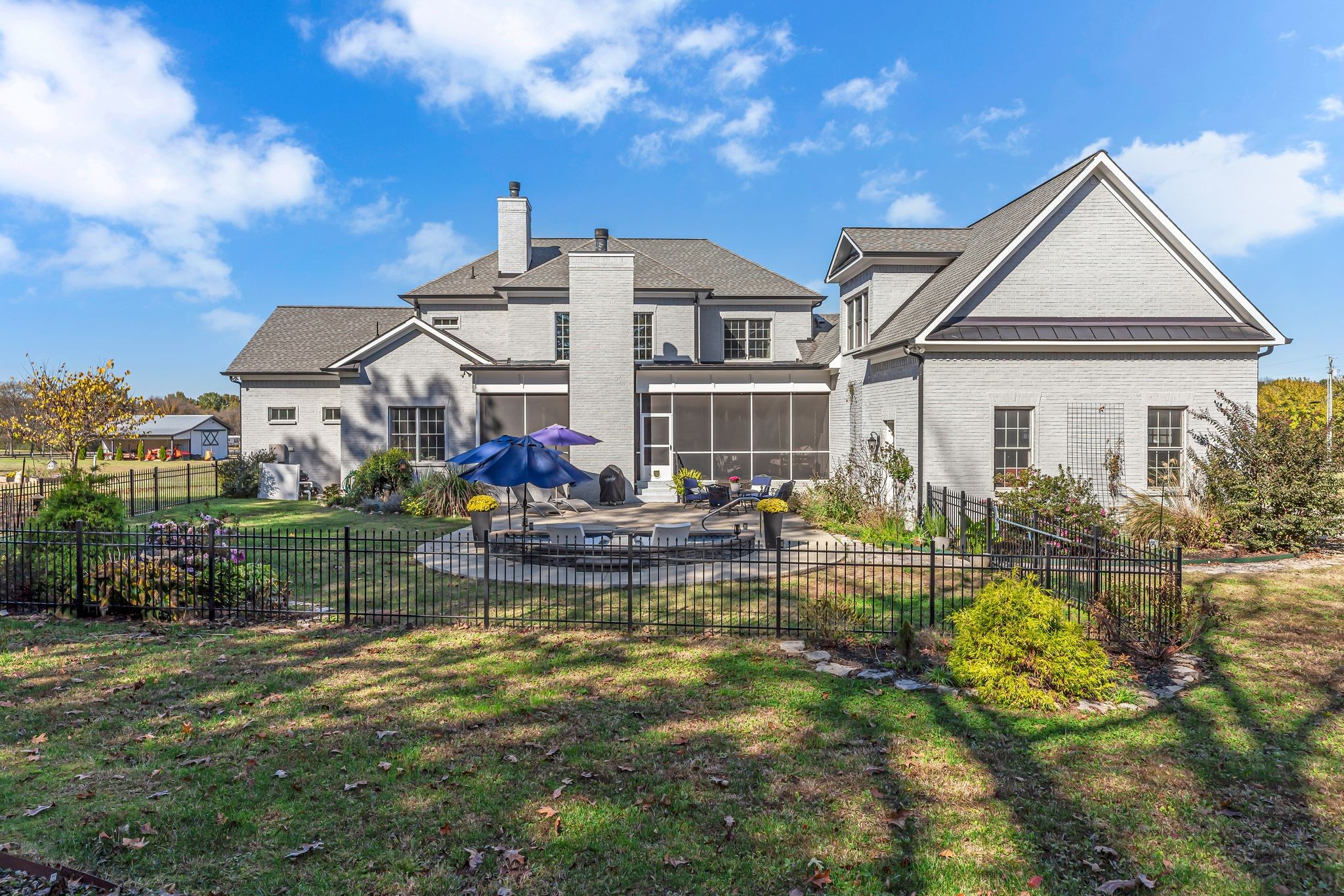7167 Williams Road Christiana, TN 37037 - Photo 50 of 53 a front view of a house with swimming pool having outdoor seating
