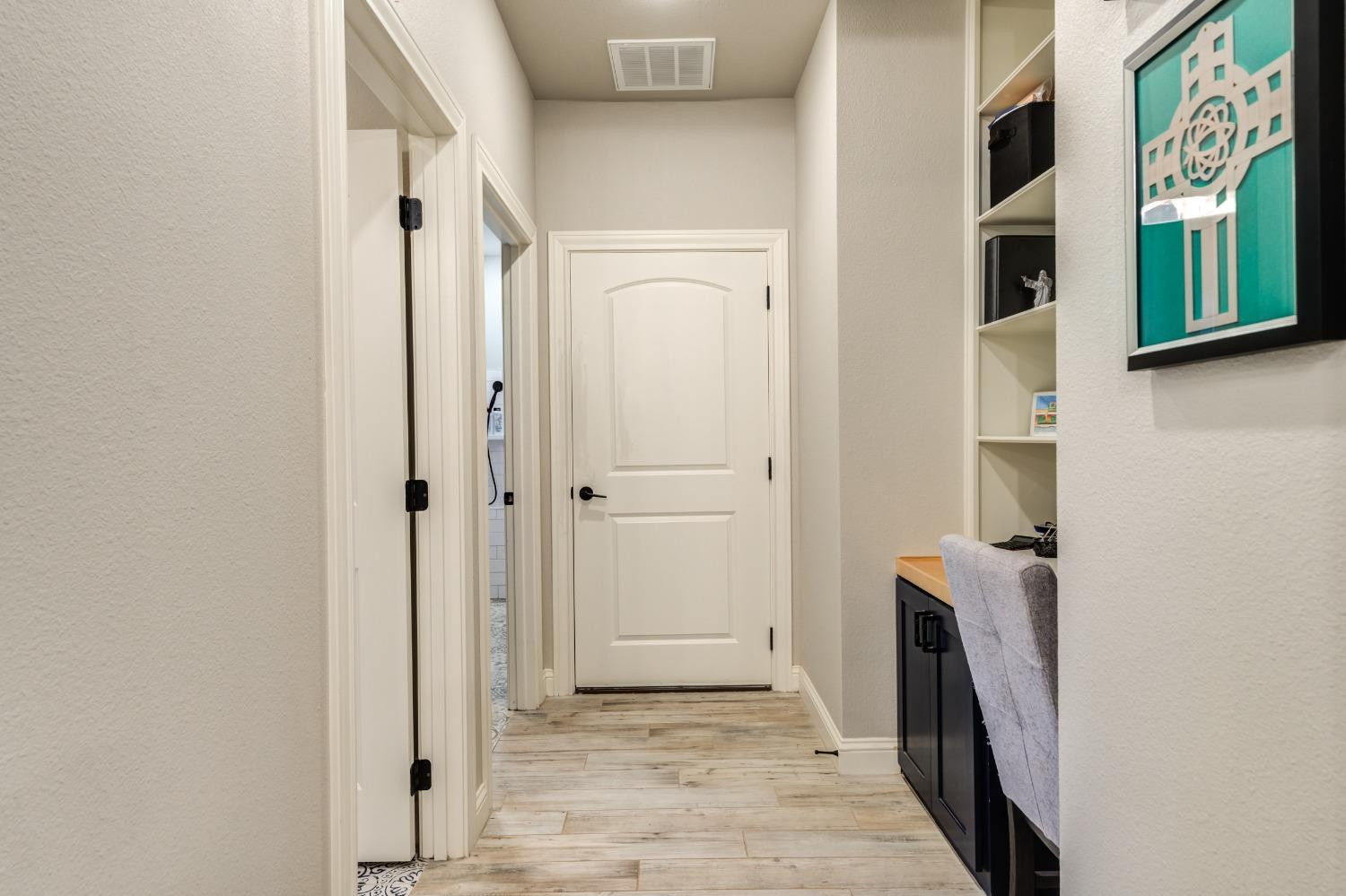 4908 109th Place Lubbock, TX 79424 - Photo 14 of 44 a view of a storage & utility room in a house