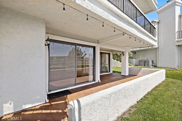 a view of lobby with furniture and floor to ceiling window