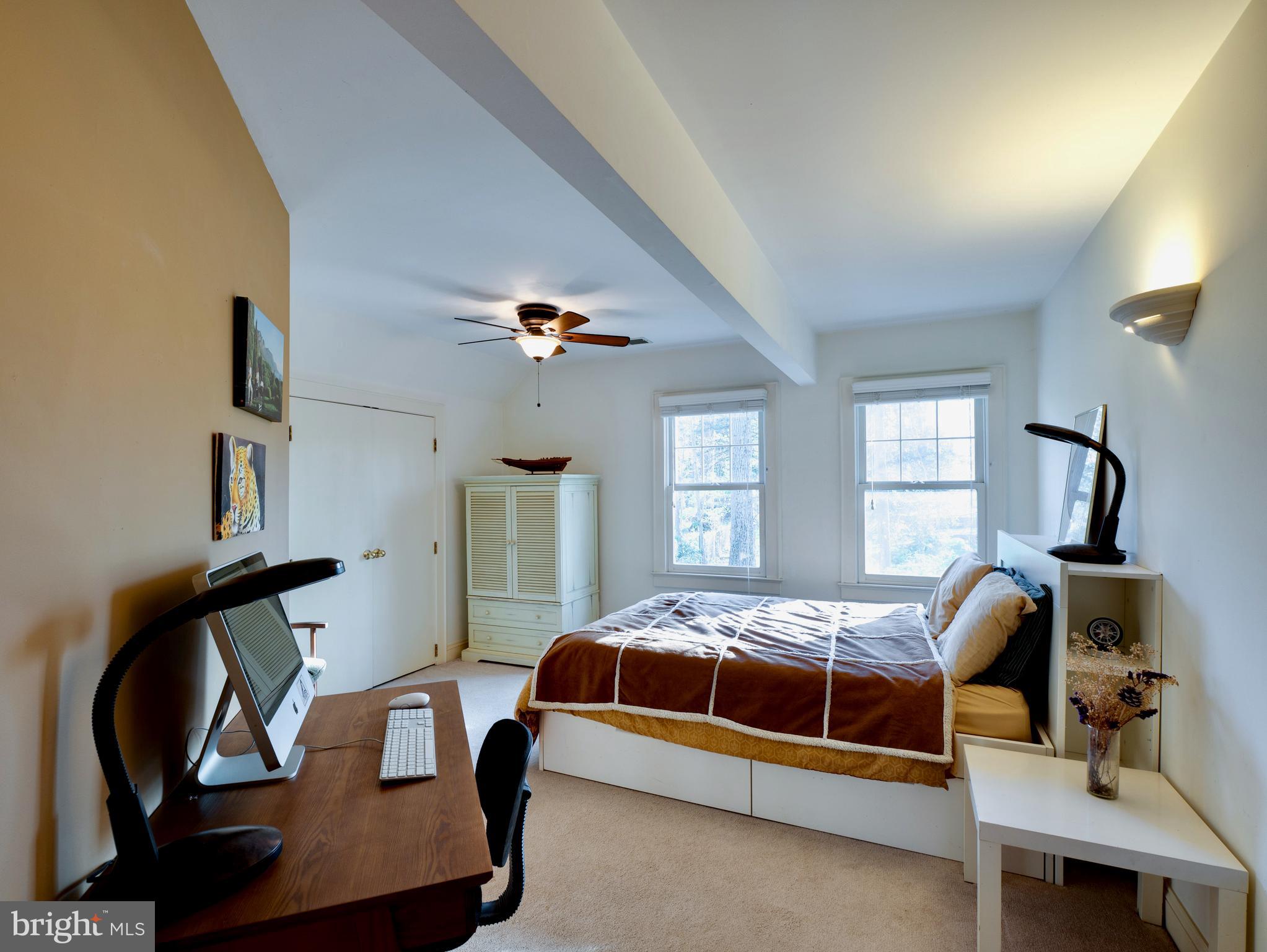 6306 Valley Road Bethesda, MD 20817 - Photo 42 of 74 a bedroom with a bed and a window
