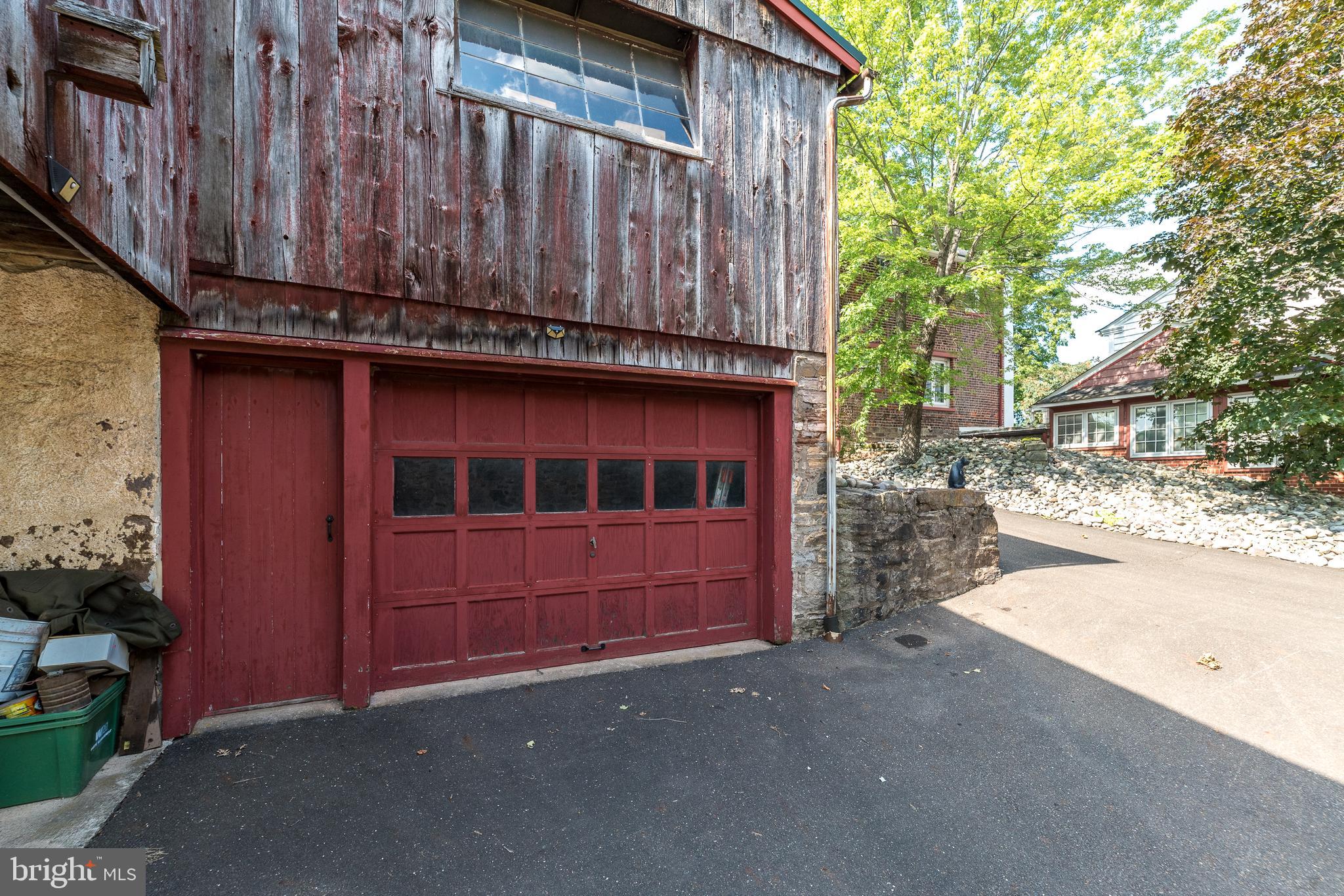 2478 River Road, Unit CARRIAGE New Hope, PA 18938 - Photo 22 of 23 a view of a house with a garage