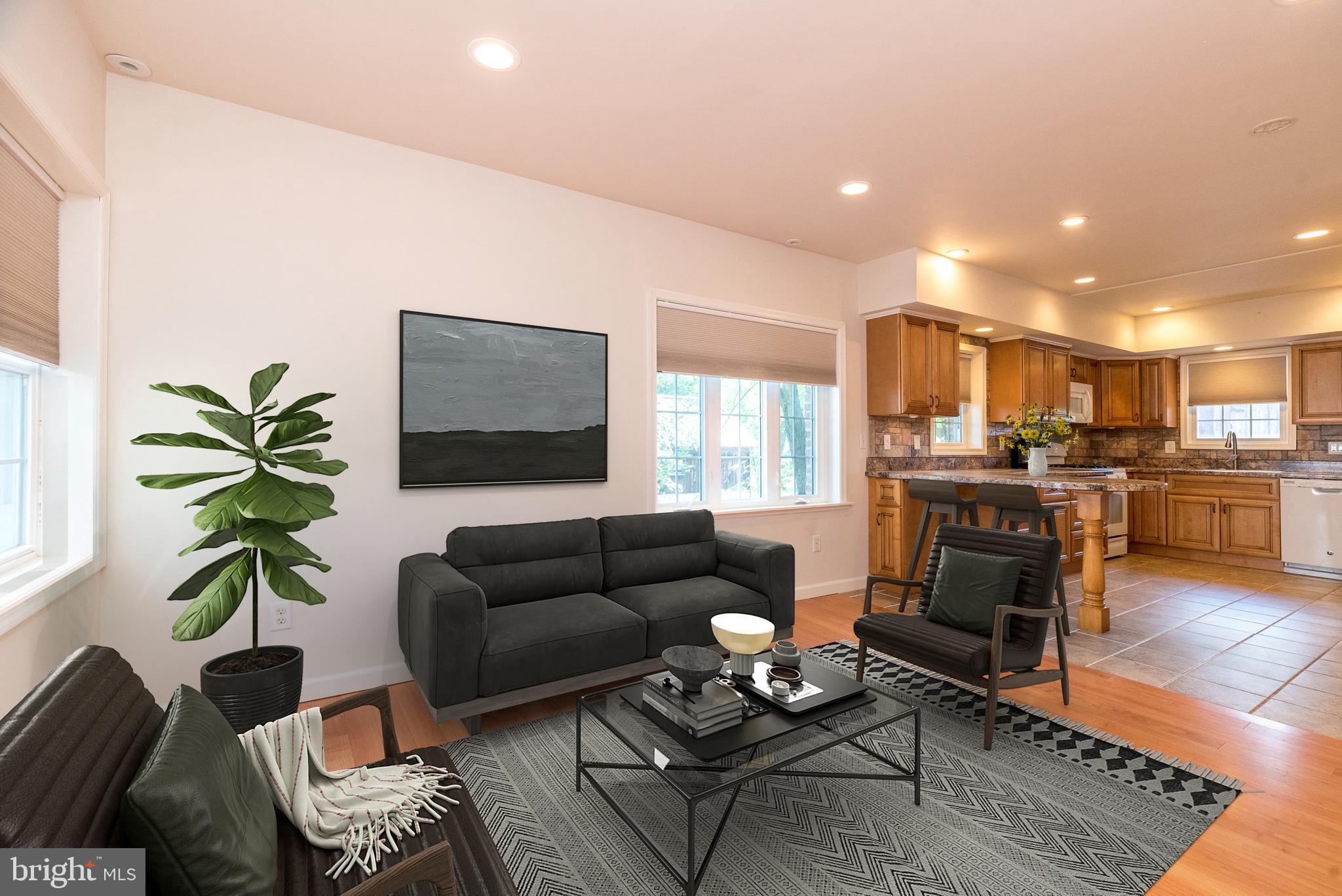 2478 River Road, Unit CARRIAGE New Hope, PA 18938 - Photo 6 of 23 a living room with furniture and kitchen view