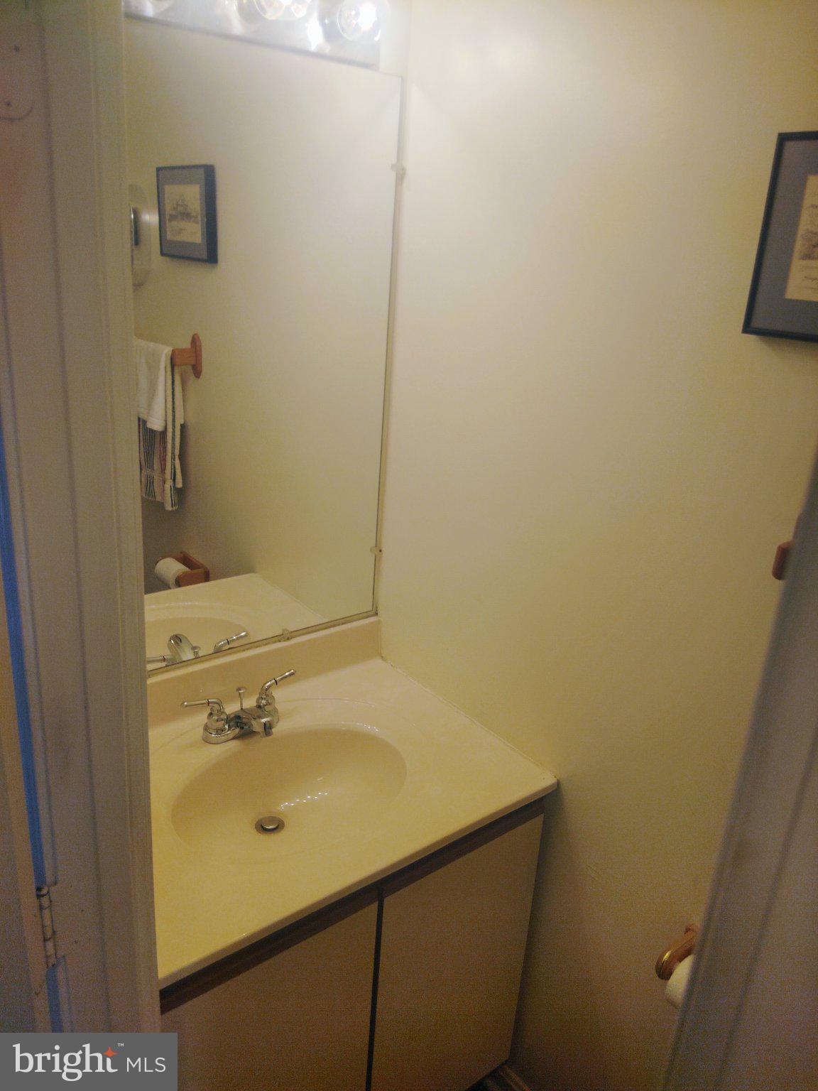 69 Johnson Smithsburg, MD 21783 - Photo 12 of 39 a bathroom with a sink and mirror