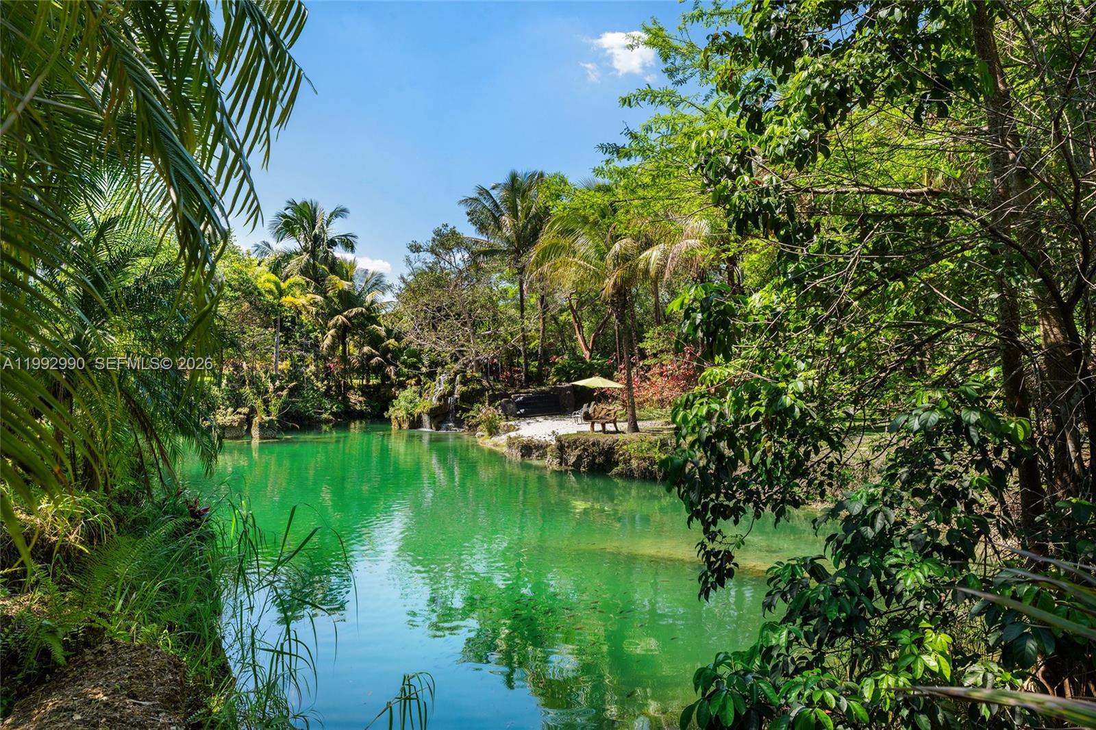 15000 Southwest 200th Street Miami, FL 33187 - Photo 44 of 76 a view of a lake in a garden