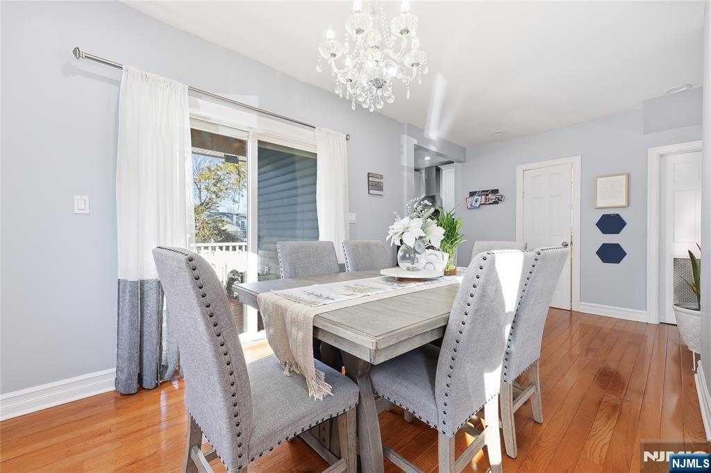 42 South Demarest Avenue Bergenfield, NJ 07621 - Photo 12 of 39 a view of a dining room with furniture window and wooden floor