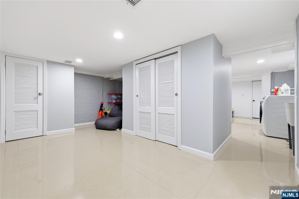 42 South Demarest Avenue Bergenfield, NJ 07621 - Photo 26 of 39 an empty room with furniture and closet