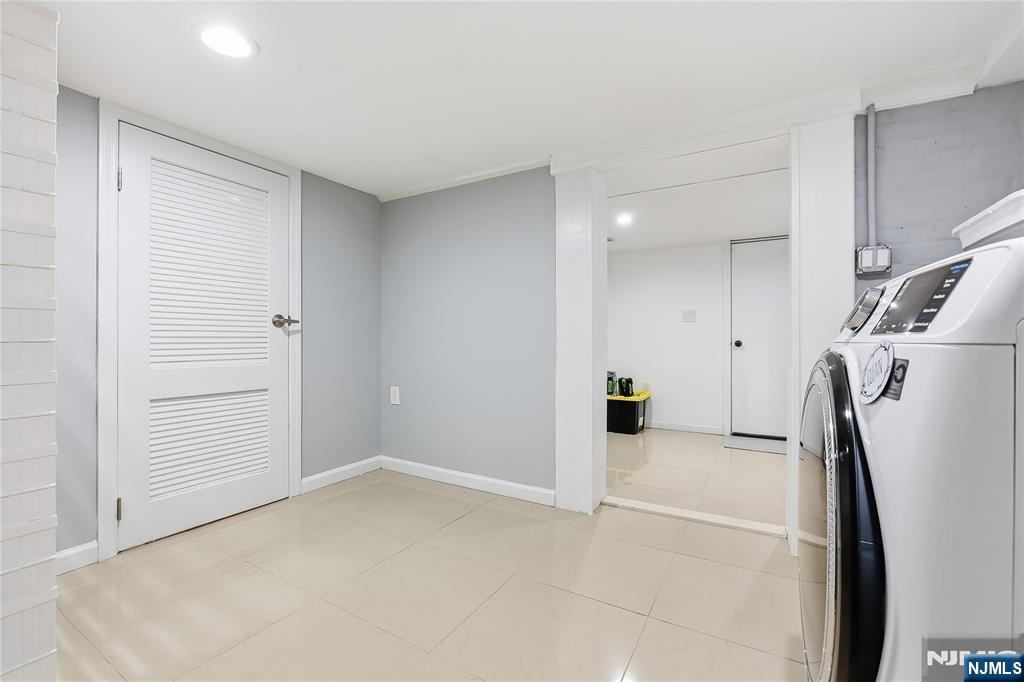 42 South Demarest Avenue Bergenfield, NJ 07621 - Photo 28 of 39 a view of a storage & utility room with a sink