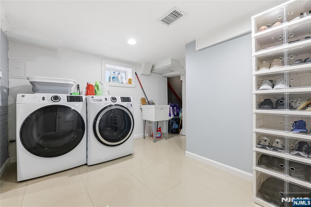 42 South Demarest Avenue Bergenfield, NJ 07621 - Photo 29 of 39 a utility room with dryer and washer
