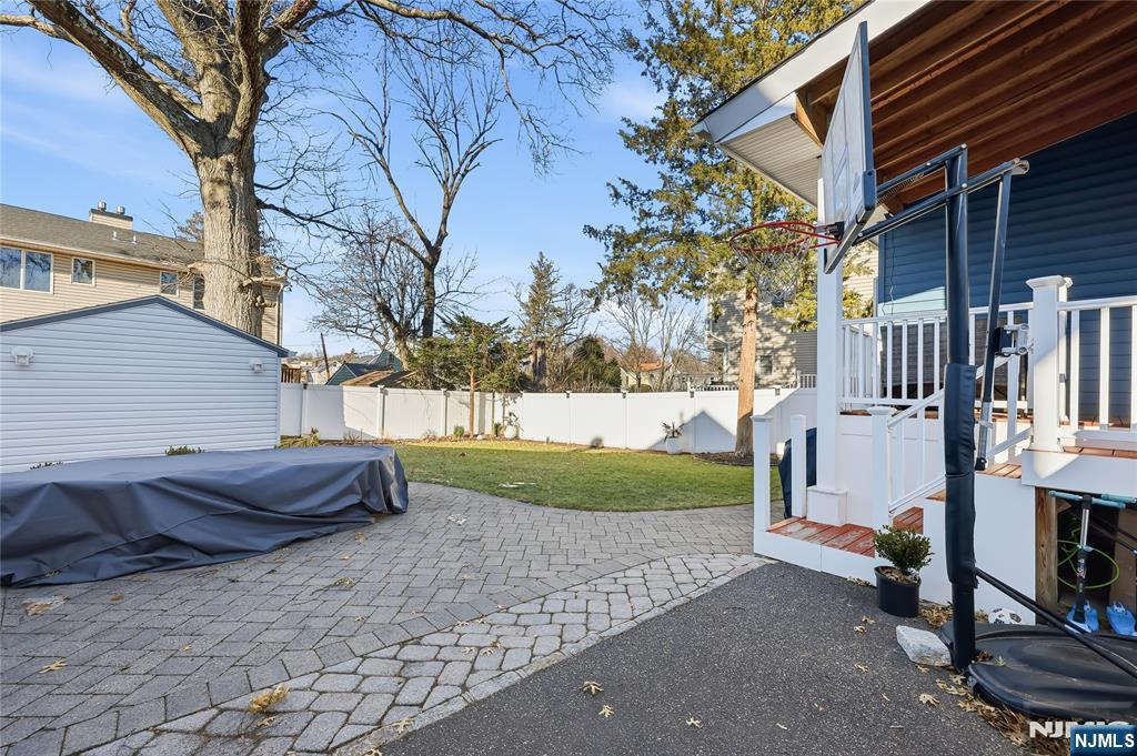 42 South Demarest Avenue Bergenfield, NJ 07621 - Photo 33 of 39 a view of a house with a back yard