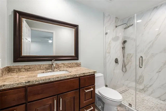 a view of a house with backyard porch and sitting area