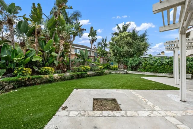 a view of a house with a garden