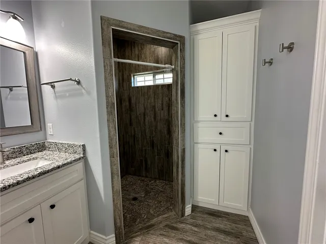 a view of bathroom with dual sinks