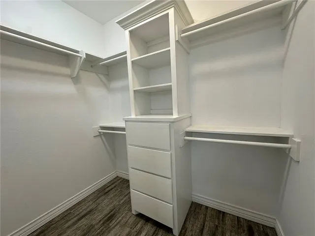 a view of an empty walk in closet