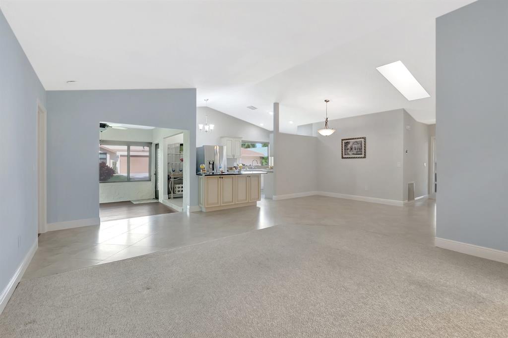 3180 Northwest 13th Street Delray Beach, FL 33445 - Photo 13 of 52 a view of a kitchen with a sink and a window
