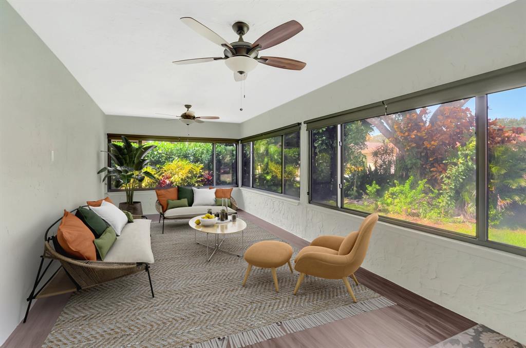 3180 Northwest 13th Street Delray Beach, FL 33445 - Photo 26 of 52 a living room with furniture and a large window