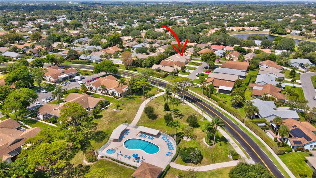 3180 Northwest 13th Street Delray Beach, FL 33445 - Photo 30 of 52 an aerial view of residential houses with outdoor space