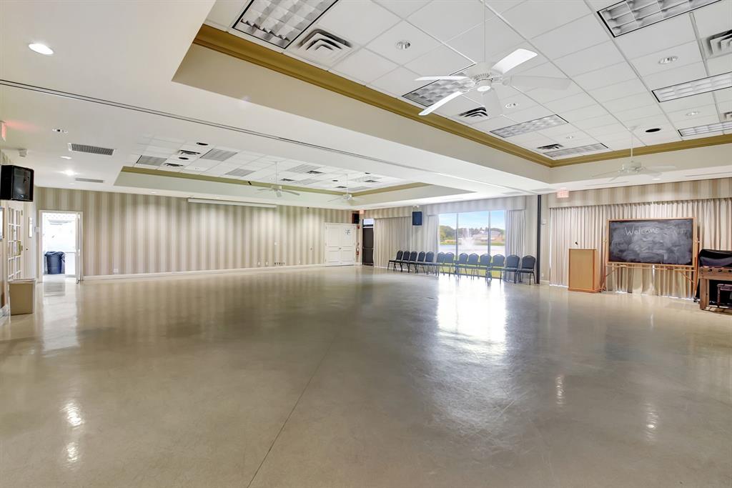 3180 Northwest 13th Street Delray Beach, FL 33445 - Photo 39 of 52 a lobby with furniture and stairs