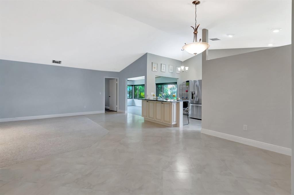 3180 Northwest 13th Street Delray Beach, FL 33445 - Photo 4 of 52 a view of a kitchen with a sink and a cabinet