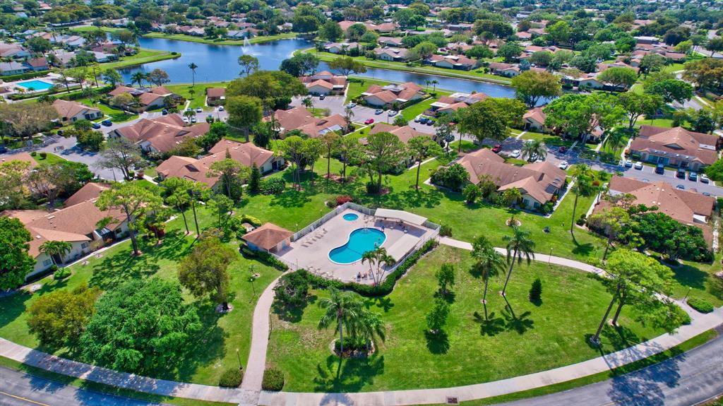 3180 Northwest 13th Street Delray Beach, FL 33445 - Photo 50 of 52 an aerial view of residential house with outdoor space and swimming pool