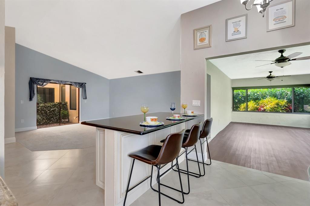 3180 Northwest 13th Street Delray Beach, FL 33445 - Photo 8 of 52 a view of a livingroom with furniture and window