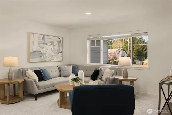 a bathroom with a granite countertop sink toilet a mirror and shower