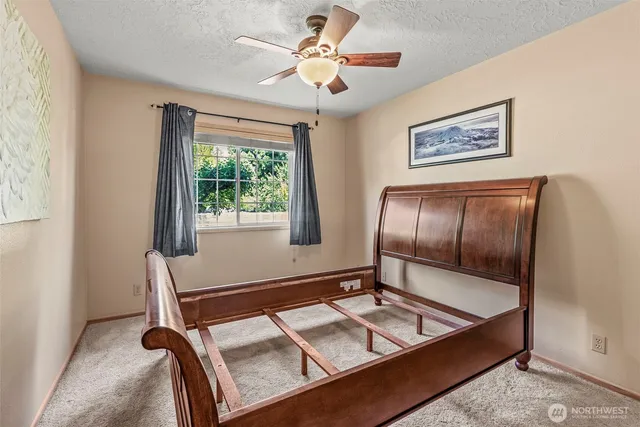 a room with chairs and window