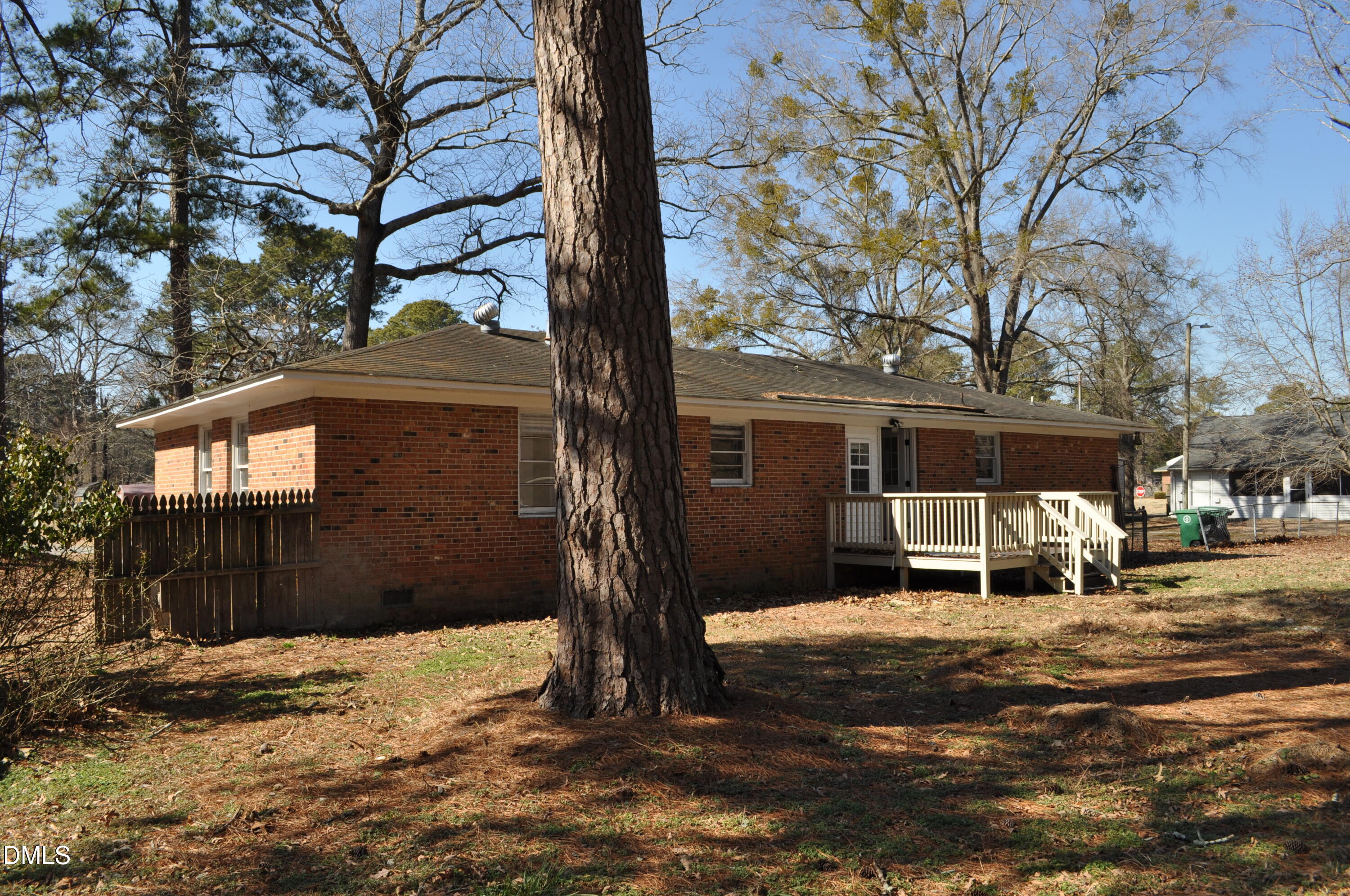 403 Huntington Road Tarboro, NC 27886 - Photo 13 of 42 a front view of a house with a yard covered in snow