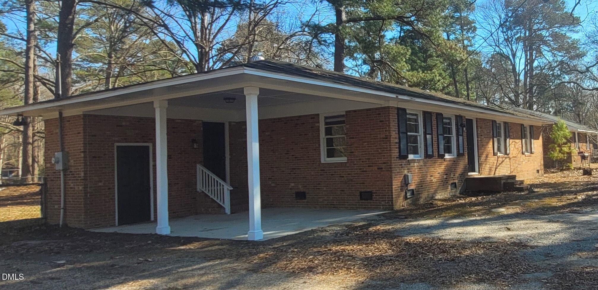 403 Huntington Road Tarboro, NC 27886 - Photo 4 of 42 a view of a house with a yard