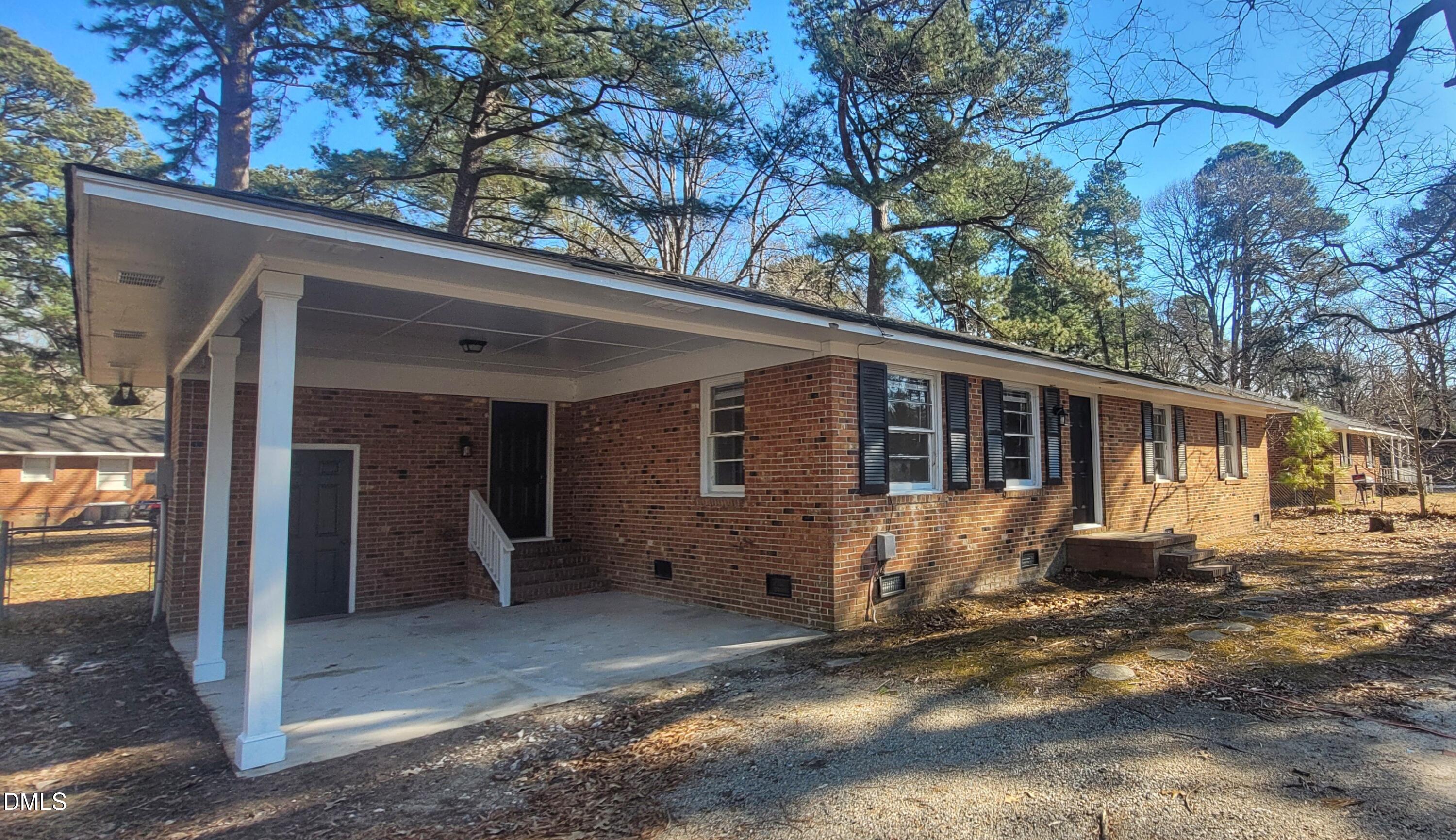 403 Huntington Road Tarboro, NC 27886 - Photo 6 of 42 a view of a house with backyard