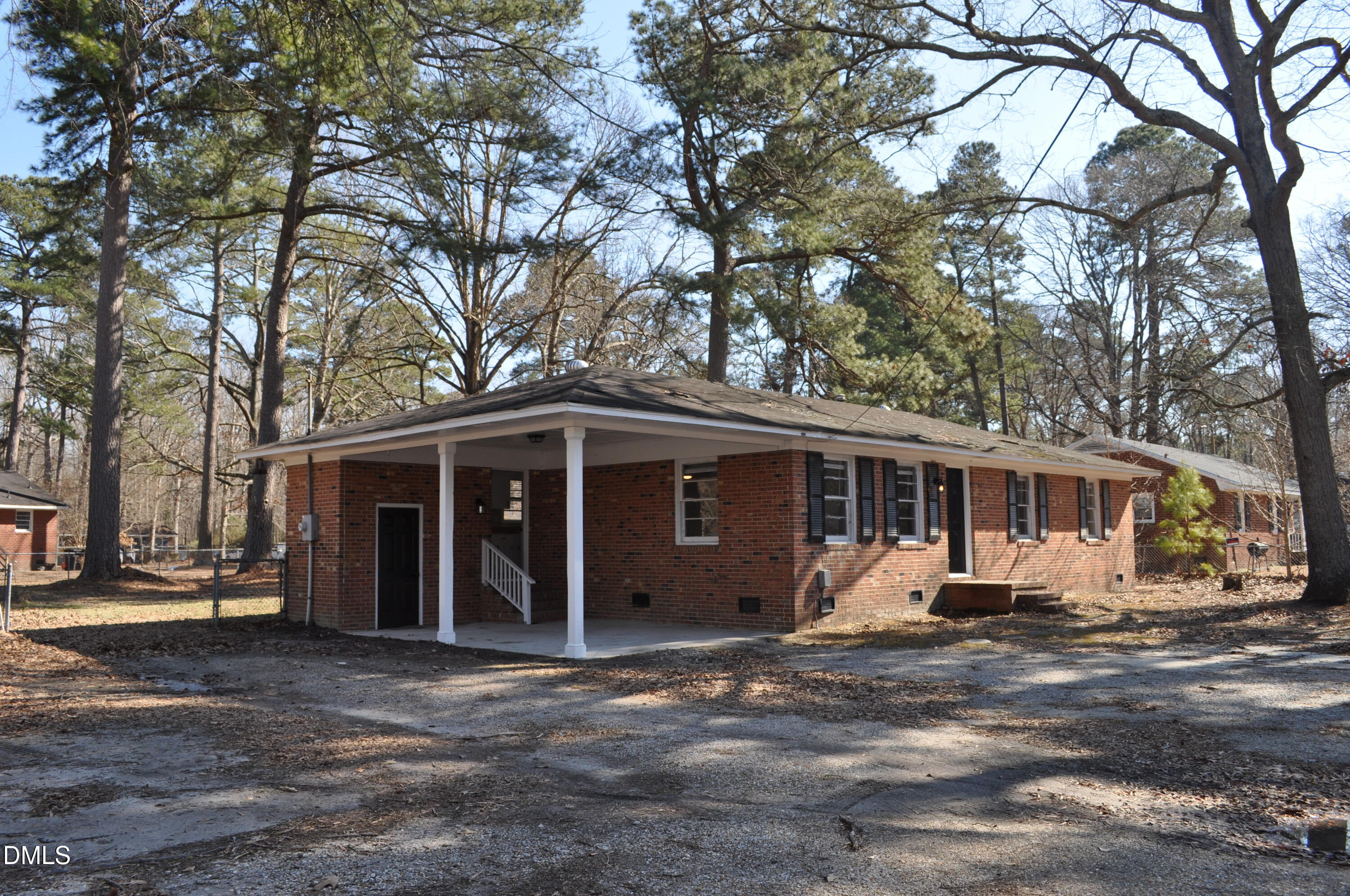 403 Huntington Road Tarboro, NC 27886 - Photo 10 of 42 a view of a house with a yard