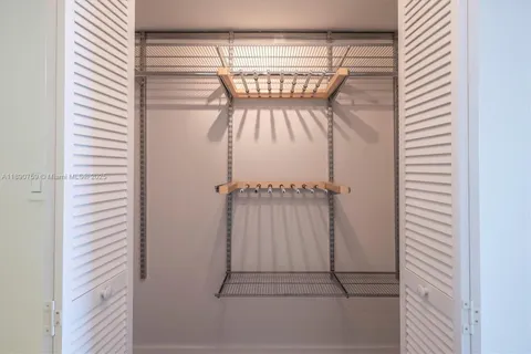 a view of a room with racks on the wall