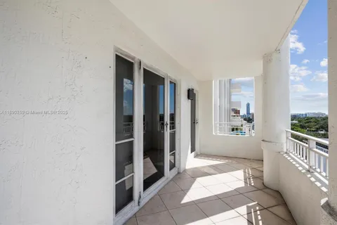 a view of a hallway with windows