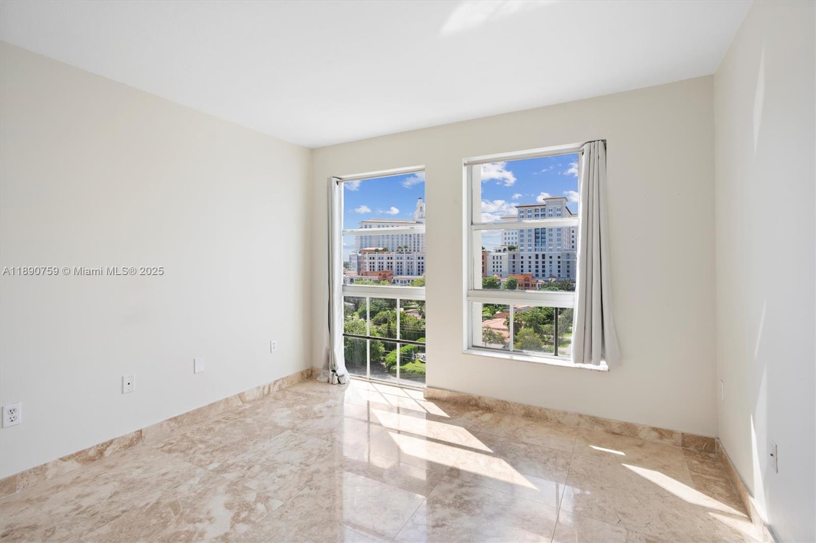 2351 Douglas Road, Unit 906 Miami, FL 33145 - Photo 34 of 45 a view of an empty room with a window